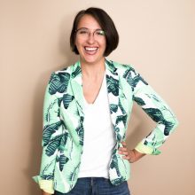 Jane Lytvynenko wearing a green jacket with a leaf pattern on it.